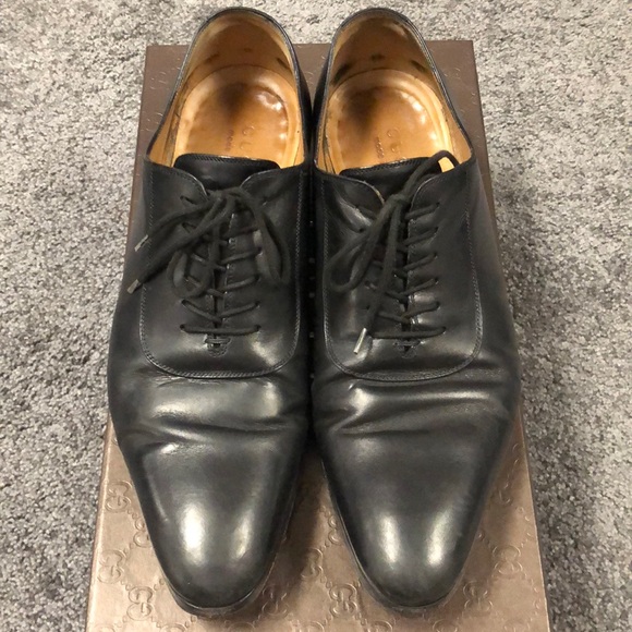 Men’s Gucci black leather lace up shoes